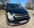 Черный Хендай H-1, объемом двигателя 2.5 л и пробегом 254 тыс. км за 13600 $, фото 1 на Automoto.ua