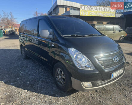 Черный Хендай H-1, объемом двигателя 2.5 л и пробегом 295 тыс. км за 15500 $, фото 1 на Automoto.ua