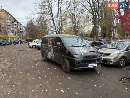 Черный Хендай H-1, объемом двигателя 2.48 л и пробегом 413 тыс. км за 5500 $, фото 1 на Automoto.ua