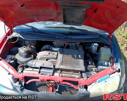 Красный Хендай H-1, объемом двигателя 2.5 л и пробегом 306 тыс. км за 3500 $, фото 1 на Automoto.ua