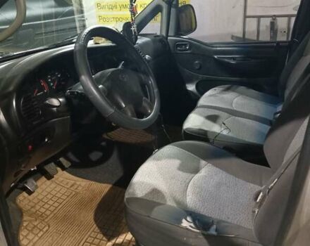 Серый Хендай H-1, объемом двигателя 2.48 л и пробегом 225 тыс. км за 3900 $, фото 1 на Automoto.ua