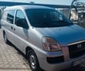 Серый Хендай H-1, объемом двигателя 2.35 л и пробегом 250 тыс. км за 4800 $, фото 1 на Automoto.ua