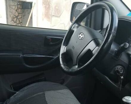 Серый Хендай H-1, объемом двигателя 2.5 л и пробегом 311 тыс. км за 8700 $, фото 10 на Automoto.ua