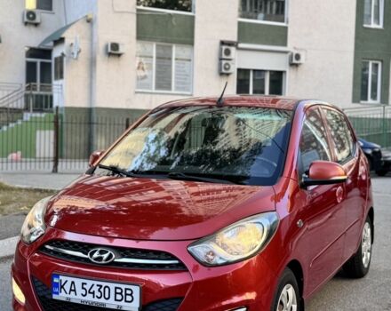 Красный Хендай и10, объемом двигателя 1.25 л и пробегом 75 тыс. км за 6999 $, фото 1 на Automoto.ua
