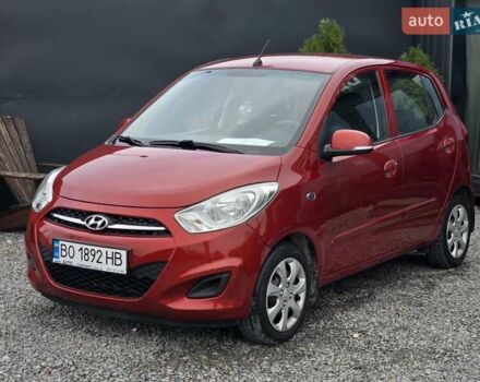 Красный Хендай и10, объемом двигателя 1.1 л и пробегом 176 тыс. км за 6499 $, фото 1 на Automoto.ua