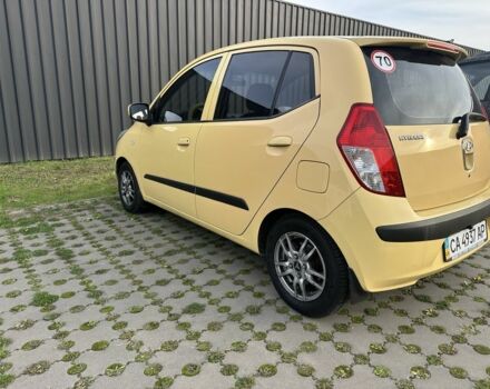 Желтый Хендай и10, объемом двигателя 1.1 л и пробегом 250 тыс. км за 5600 $, фото 2 на Automoto.ua