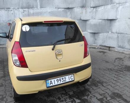 Желтый Хендай и10, объемом двигателя 1.09 л и пробегом 242 тыс. км за 5700 $, фото 2 на Automoto.ua