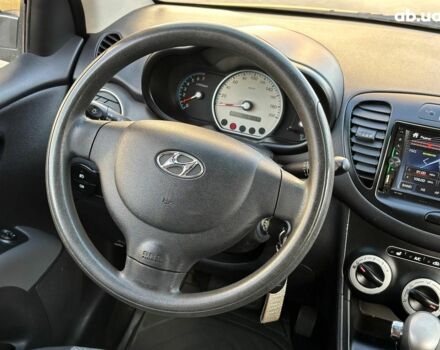 Желтый Хендай и10, объемом двигателя 1.1 л и пробегом 99 тыс. км за 6440 $, фото 17 на Automoto.ua