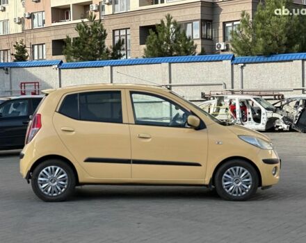 Желтый Хендай и10, объемом двигателя 1.1 л и пробегом 99 тыс. км за 6440 $, фото 3 на Automoto.ua