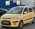 Желтый Хендай и10, объемом двигателя 1.1 л и пробегом 99 тыс. км за 6440 $, фото 1 на Automoto.ua