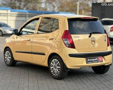 Желтый Хендай и10, объемом двигателя 1.1 л и пробегом 99 тыс. км за 6440 $, фото 6 на Automoto.ua