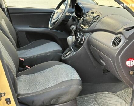 Желтый Хендай и10, объемом двигателя 1.1 л и пробегом 99 тыс. км за 6440 $, фото 18 на Automoto.ua