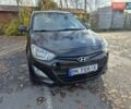 Черный Хендай и20, объемом двигателя 1.4 л и пробегом 224 тыс. км за 5950 $, фото 1 на Automoto.ua