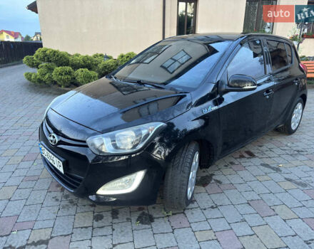 Черный Хендай и20, объемом двигателя 1.12 л и пробегом 298 тыс. км за 4999 $, фото 1 на Automoto.ua