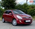Красный Хендай и20, объемом двигателя 1.2 л и пробегом 155 тыс. км за 4499 $, фото 1 на Automoto.ua