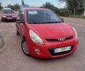 Красный Хендай и20, объемом двигателя 1.2 л и пробегом 235 тыс. км за 3800 $, фото 1 на Automoto.ua