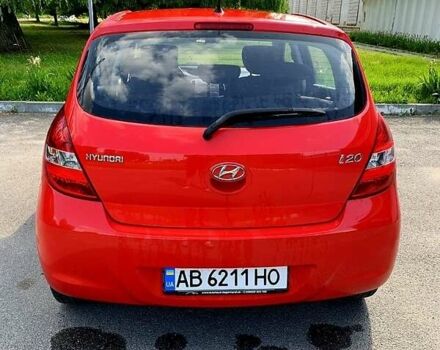 Красный Хендай и20, объемом двигателя 1.2 л и пробегом 177 тыс. км за 5700 $, фото 1 на Automoto.ua