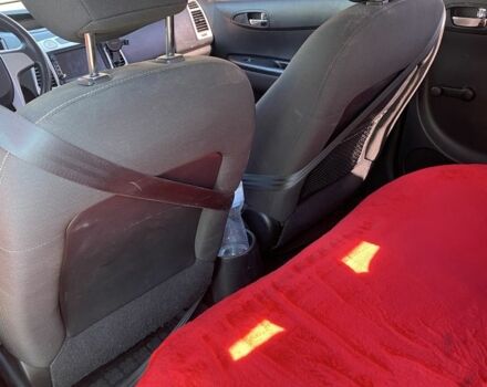 Красный Хендай и20, объемом двигателя 1.2 л и пробегом 240 тыс. км за 5500 $, фото 9 на Automoto.ua