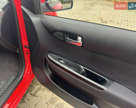 Красный Хендай и20, объемом двигателя 1.4 л и пробегом 80 тыс. км за 8300 $, фото 32 на Automoto.ua