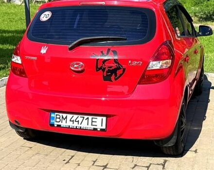 Красный Хендай и20, объемом двигателя 1.2 л и пробегом 178 тыс. км за 5700 $, фото 1 на Automoto.ua