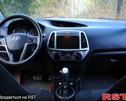 Красный Хендай и20, объемом двигателя 1.4 л и пробегом 116 тыс. км за 7700 $, фото 7 на Automoto.ua