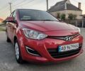 Красный Хендай и20, объемом двигателя 1.4 л и пробегом 104 тыс. км за 9800 $, фото 1 на Automoto.ua