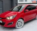 Красный Хендай и20, объемом двигателя 1.4 л и пробегом 160 тыс. км за 9300 $, фото 1 на Automoto.ua