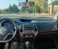 Красный Хендай и20, объемом двигателя 1.4 л и пробегом 104 тыс. км за 9800 $, фото 4 на Automoto.ua