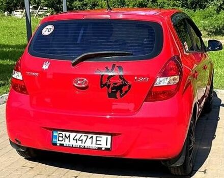 Красный Хендай и20, объемом двигателя 1.2 л и пробегом 178 тыс. км за 5300 $, фото 1 на Automoto.ua