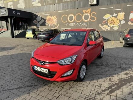 Красный Хендай и20, объемом двигателя 1.2 л и пробегом 165 тыс. км за 6700 $, фото 1 на Automoto.ua