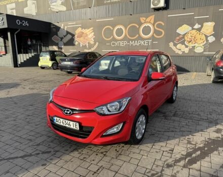 Красный Хендай и20, объемом двигателя 1.2 л и пробегом 165 тыс. км за 6700 $, фото 1 на Automoto.ua