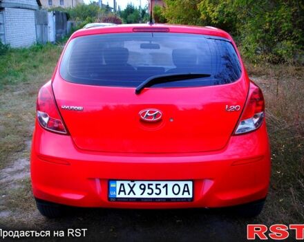 Красный Хендай и20, объемом двигателя 1.4 л и пробегом 116 тыс. км за 7700 $, фото 1 на Automoto.ua