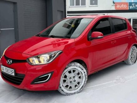 Червоний Хендай і20, об'ємом двигуна 1.4 л та пробігом 160 тис. км за 9300 $, фото 1 на Automoto.ua