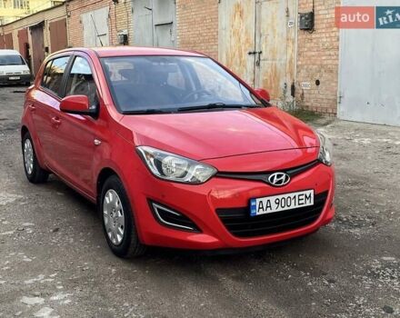 Красный Хендай и20, объемом двигателя 1.4 л и пробегом 159 тыс. км за 8850 $, фото 1 на Automoto.ua