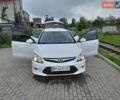 Белый Хендай i30, объемом двигателя 1.58 л и пробегом 256 тыс. км за 6500 $, фото 1 на Automoto.ua