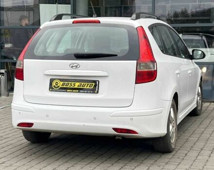 Белый Хендай i30, объемом двигателя 1.6 л и пробегом 250 тыс. км за 5700 $, фото 6 на Automoto.ua