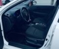 Белый Хендай i30, объемом двигателя 1.6 л и пробегом 236 тыс. км за 7300 $, фото 7 на Automoto.ua