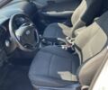 Білий Хендай i30, об'ємом двигуна 1.4 л та пробігом 217 тис. км за 5599 $, фото 4 на Automoto.ua