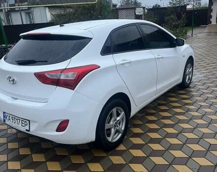 Белый Хендай i30, объемом двигателя 1.4 л и пробегом 127 тыс. км за 8800 $, фото 2 на Automoto.ua