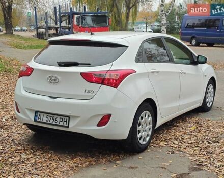 Белый Хендай i30, объемом двигателя 1.4 л и пробегом 105 тыс. км за 8400 $, фото 5 на Automoto.ua
