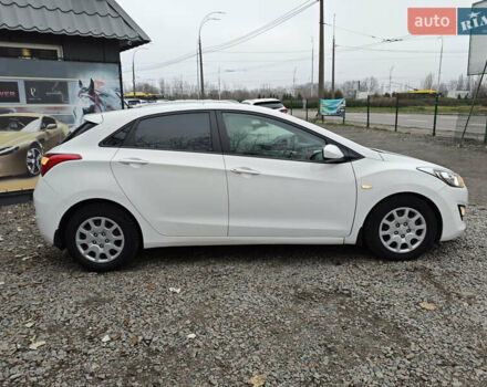 Білий Хендай i30, об'ємом двигуна 1.4 л та пробігом 105 тис. км за 8400 $, фото 4 на Automoto.ua