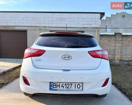 Белый Хендай i30, объемом двигателя 1.4 л и пробегом 180 тыс. км за 7500 $, фото 3 на Automoto.ua