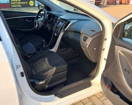 Белый Хендай i30, объемом двигателя 1.4 л и пробегом 180 тыс. км за 7500 $, фото 14 на Automoto.ua