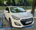 Белый Хендай i30, объемом двигателя 1.4 л и пробегом 131 тыс. км за 8105 $, фото 1 на Automoto.ua