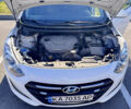 Білий Хендай i30, об'ємом двигуна 1.59 л та пробігом 158 тис. км за 12400 $, фото 13 на Automoto.ua