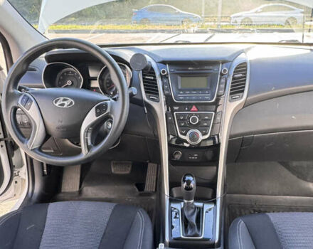 Білий Хендай i30, об'ємом двигуна 1.59 л та пробігом 158 тис. км за 12400 $, фото 27 на Automoto.ua