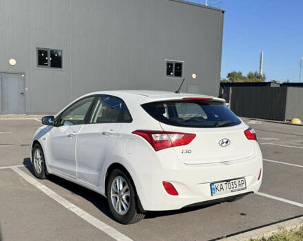Білий Хендай i30, об'ємом двигуна 1.59 л та пробігом 158 тис. км за 12400 $, фото 10 на Automoto.ua