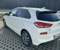 Білий Хендай i30, об'ємом двигуна 1.4 л та пробігом 210 тис. км за 12000 $, фото 3 на Automoto.ua