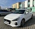 Білий Хендай i30, об'ємом двигуна 1.4 л та пробігом 210 тис. км за 12000 $, фото 1 на Automoto.ua