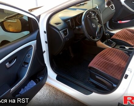 Білий Хендай i30, об'ємом двигуна 1.4 л та пробігом 206 тис. км за 8790 $, фото 5 на Automoto.ua
